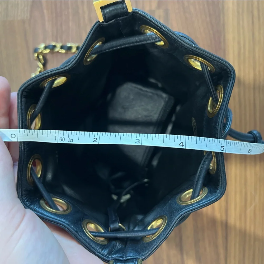 CHANEL Black Quilted Leather Drawstring Bucket Bag with Gold Hardware